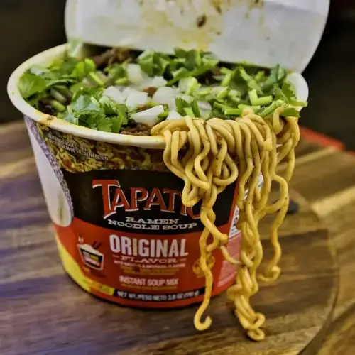Birria ramen bowl with Maruchan noodles in rich beef birria broth and consomé — Takitos Con Sabor TX